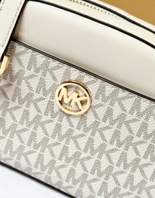 Load image into Gallery viewer, MICHAEL KORS JET SET GLAM SMALL FRONT POCKET OVAL CROSSBODY BAG MK LIGHT CREAM
