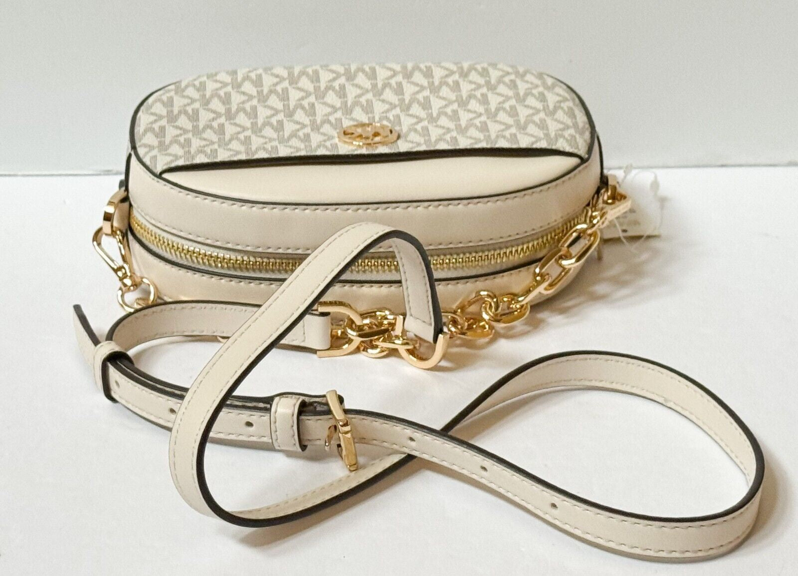 MICHAEL KORS JET SET GLAM SMALL FRONT POCKET OVAL CROSSBODY BAG MK LIGHT CREAM