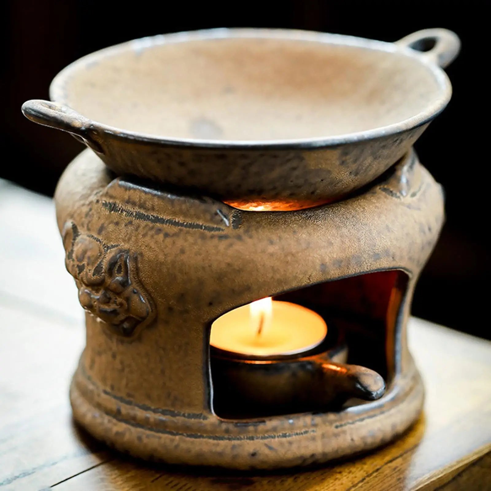 Aroma burner with candle spoon