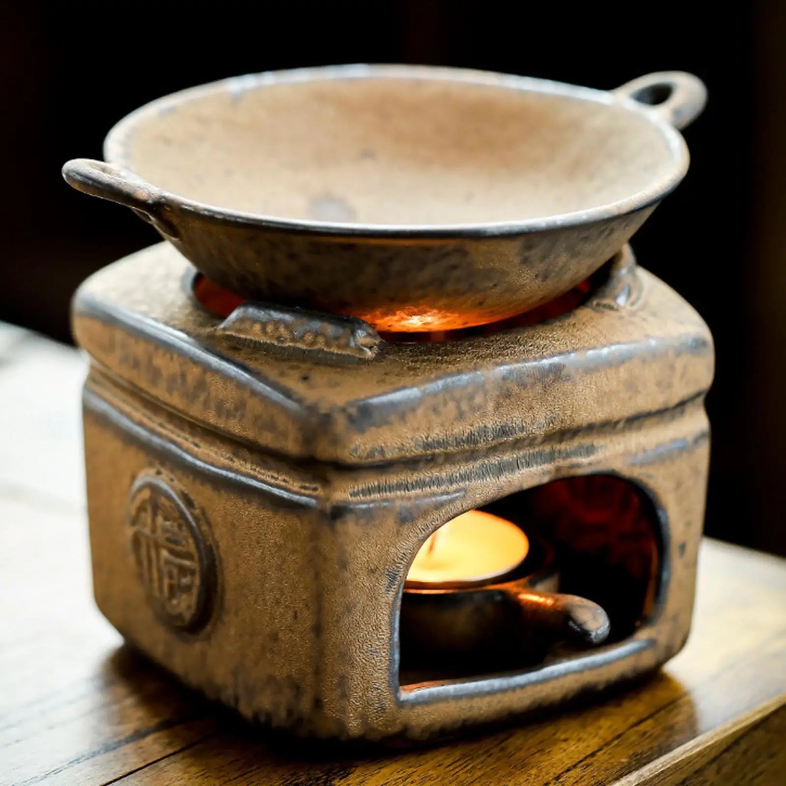 Aroma burner with candle spoon